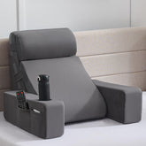 Paxato reading pillow with armrests provides stable bed reading support.