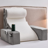 Paxato reading pillow with armrests supports comfortable bed reading and hands-free posture.