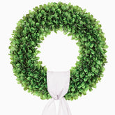 Petalyn boxwood wreath on a front door adds year-round curb appeal.