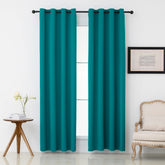 Pickluc teal blackout curtains with grommets, two-panel arrangement for privacy and room darkening.