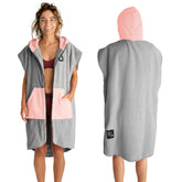 Pilotfish Surf Poncho hooded towel in gray and pink offers quick dry comfort after water activities.