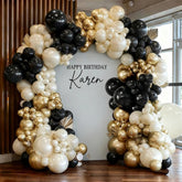 Pinbra black white gold balloon garland arch kit with complete setup components.