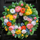 Pinkpuii spring wreath on front door with peonies and roses, boosting curb appeal.
