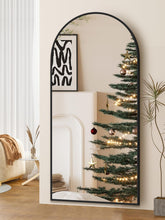 PIUDOC floor mirror with arch display provides full body reflection in bright spaces.