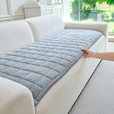 PJLZJFBY couch cover on a sofa with a dog, protecting furniture while staying soft.