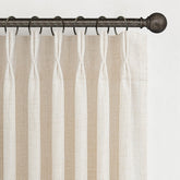 PleatedDrapes pinch-pleated linen curtains for living rooms enhance privacy and soft daylight.