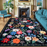 PLHXFR 8x10 floral vintage black rug in a living room, adding warmth and style.