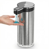 Poaoed automatic soap dispenser sensor demonstrates touchless use for hygiene.