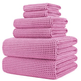POLYTE bath towel 30x60 in with waffle weave dries quickly and feels plush.
