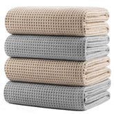 POLYTE waffle-weave bath towel close-up showing plush microfiber for fast drying.