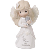 Precious Moments communion angel figurine ready for display, a meaningful keepsake.