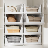 Proarea 5-pack stackable bins organized on a shelf for clothing.