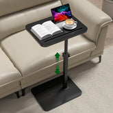 Promitop black side tray table on couch with 360Β° swivel for flexible dining.