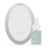 Pura Mini diffuser on a nightstand with a soft LED glow for ambient fragrance