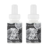 Pura Paddywax refill bottle with tobacco and patchouli notes enhances living spaces