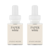 Pura Paper White refill bottle with cotton and amber notes elevates contemporary spaces for a clean, inviting atmosphere.