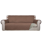 PureFit reversible quilted sofa cover front view shows dual color options and protection.