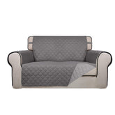 PureFit reversible quilted sofa cover in gray with dual color option protects and refreshes your loveseat.
