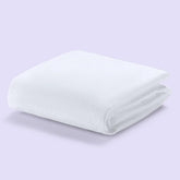Purple mattress protector top view protecting king bed from spills.