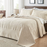 Qucover oversized king bedspread laid flat on a large bed showing full coverage.