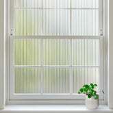 rabbitgoo Reeded glass window film provides privacy with a 3D look and natural light.