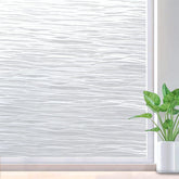 Rabbitgoo window film shows ocean waves visual, brightening interiors while maintaining light