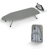 RAINHOL mini ironing board opened on a table, space-saving and ready for quick ironing