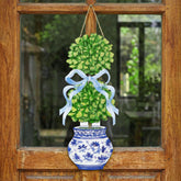 RattanView bonsai door hanger front view, welcoming spring entryway.