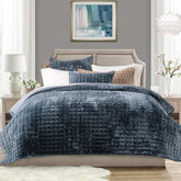 RECYCO luxury velvet quilt set in stormy blue on bed with soft sheen