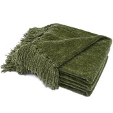 RECYCO chenille throw blanket with fringe tassels styled on a living room sofa