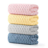 REDKISS four-pack microfiber bath towels in extra-large size for full-body coverage.