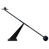 Remenna black metal candle holder with sleek silhouette for modern table decor