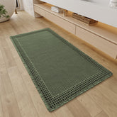 RESARE Christmas waffle bathroom runner with tassels adds cozy texture to a green bath.
