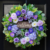 Rimalo 24-inch wreath with lavender blooms greeting guests at the front door