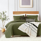ROARINGWILD olive-green cloud king quilt on bed offers cozy warmth and natural look.