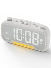 ROCAM Clock Radio front view with fabric-front design adds a modern bedside look.