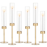 Romadedi glass hurricane candlestick holder in gold, tall and clear for elegant centerpieces.