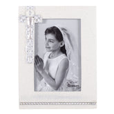 Roman Communion Frame Silver 8-inch elegantly displays a 4x6 photo in a sacred space.