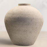RyddeligHome handmade large round vase centerpiece elevates dining table decor.