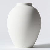 RyddeligHome white vase round-oval-9inch, durable iron construction for busy households.