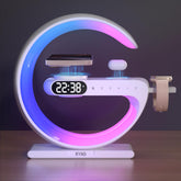 RYND 2026 magnetic 5-in-1 alarm clock with wireless charger on a desk.