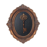 S-MANTIS vintage wall sculpture with antique gold key design enhances classic decor.