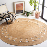 SAFAVIEH NF364A round natural fiber rug with braided design, ideal for cozy living spaces.
