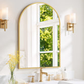SageNest arched wall mirror with gold frame brightens any wall.