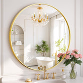 SageNest round wall mirror with 30-inch gold frame reflects brightness, ideal for small bathrooms.
