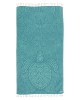 Sand Cloud Swirl Turtle Turkish Beach Towel offers soft, sand-resistant comfort.