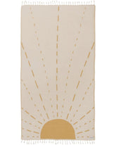 Sand Cloud Sunrise towel on the beach for sun-ready lounging and sand-free comfort
