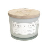 Sand + Paws Ocean Mist jar candle with soft glow that helps neutralize pet odors.