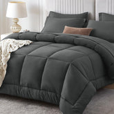 Sasttie king-size comforter set fabric close-up shows cloud-soft microfiber texture.