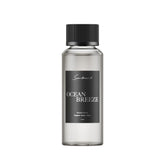 Scentiment Ocean Breeze bergamot-lemon-jasmine diffuser oil bottle for a refreshing room aroma.